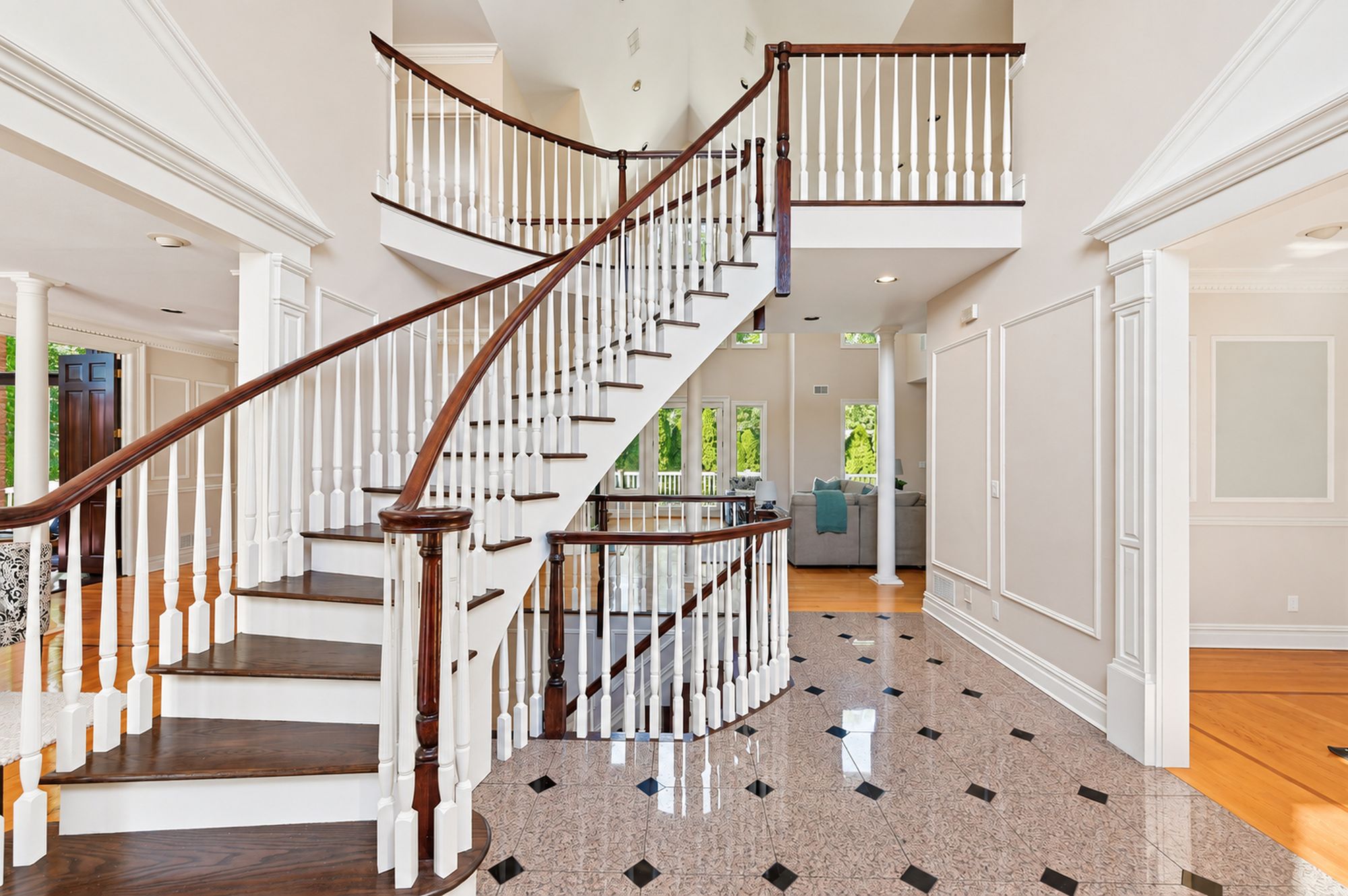 Two-story foyer and sweeping staircase at 54 Burnet Hill Road, Livingston