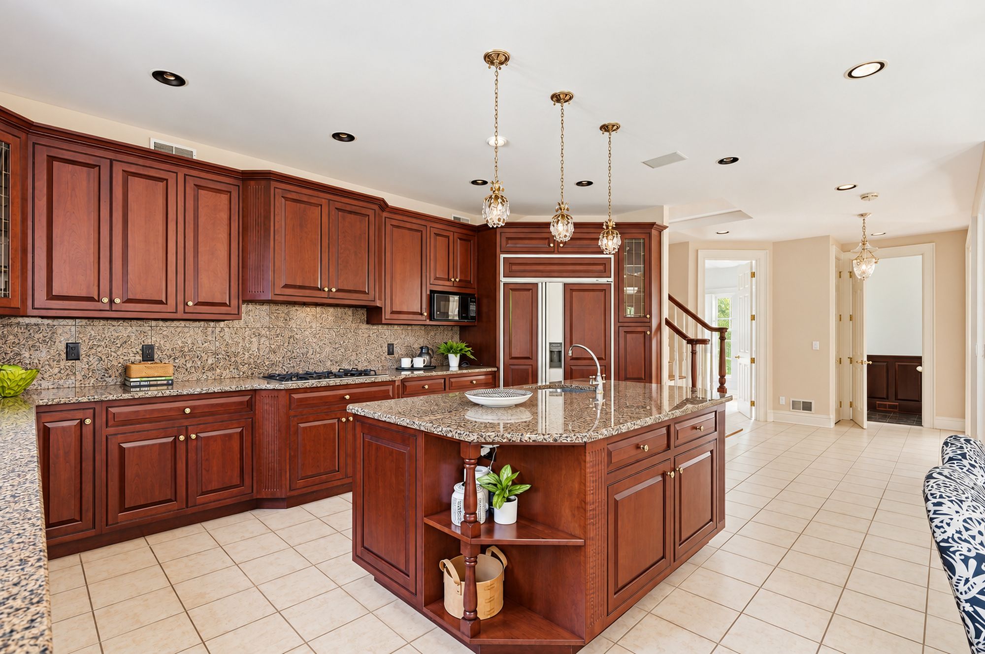 Kitchen island and cabinetry at 54 Burnet Hill Road, Livingston