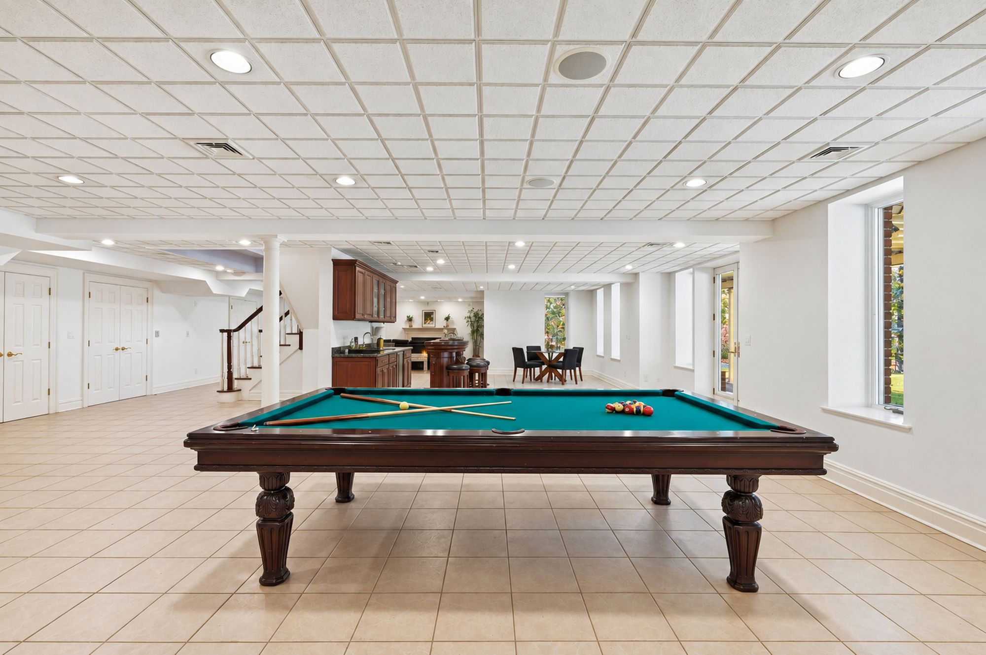 Lower-level recreation room with billiards area at 54 Burnet Hill Road, Livingston