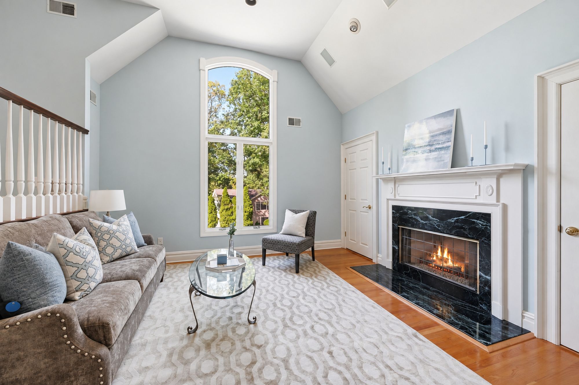 Primary suite sitting room with fireplace at 54 Burnet Hill Road, Livingston