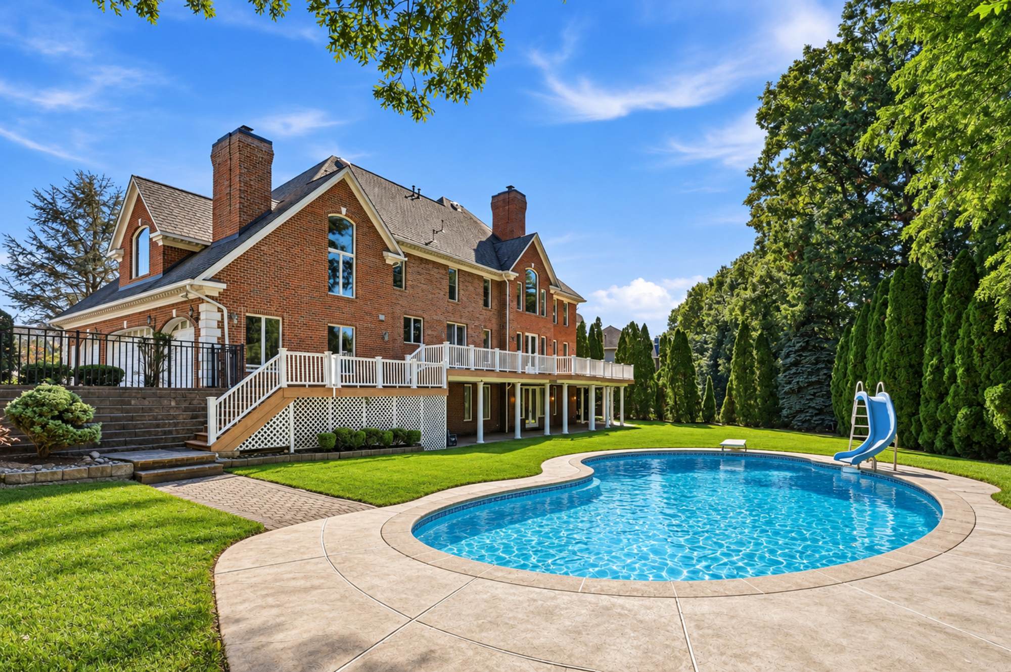 Rear of the house above the heated pool at 54 Burnet Hill Road, Livingston