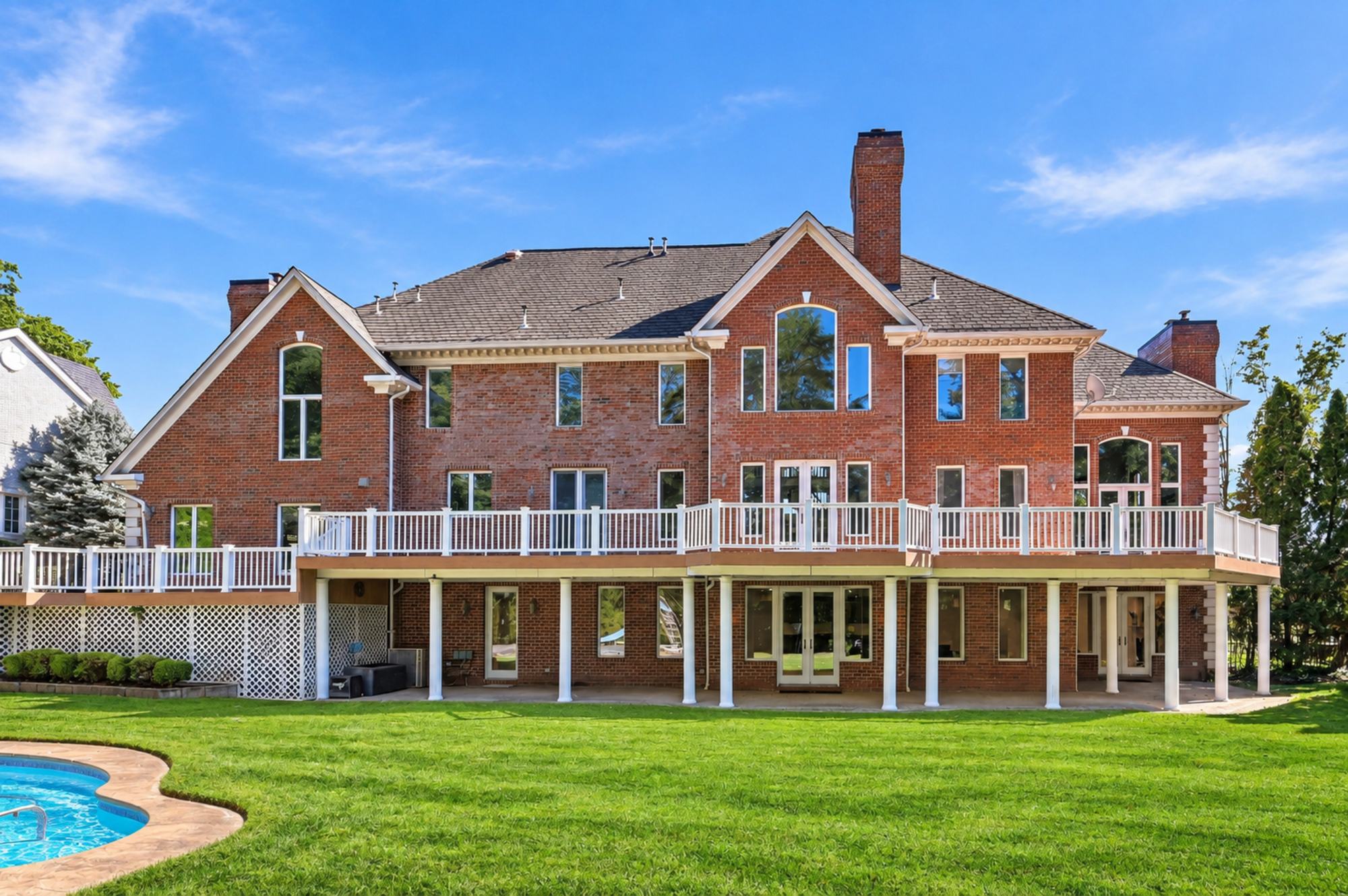 Rear facade and TimberTech deck at 54 Burnet Hill Road, Livingston